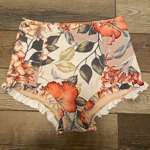 kortni jeane high waisted swim bottoms. Size medium. Floral print